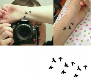 Tatuering 9 små fåglar